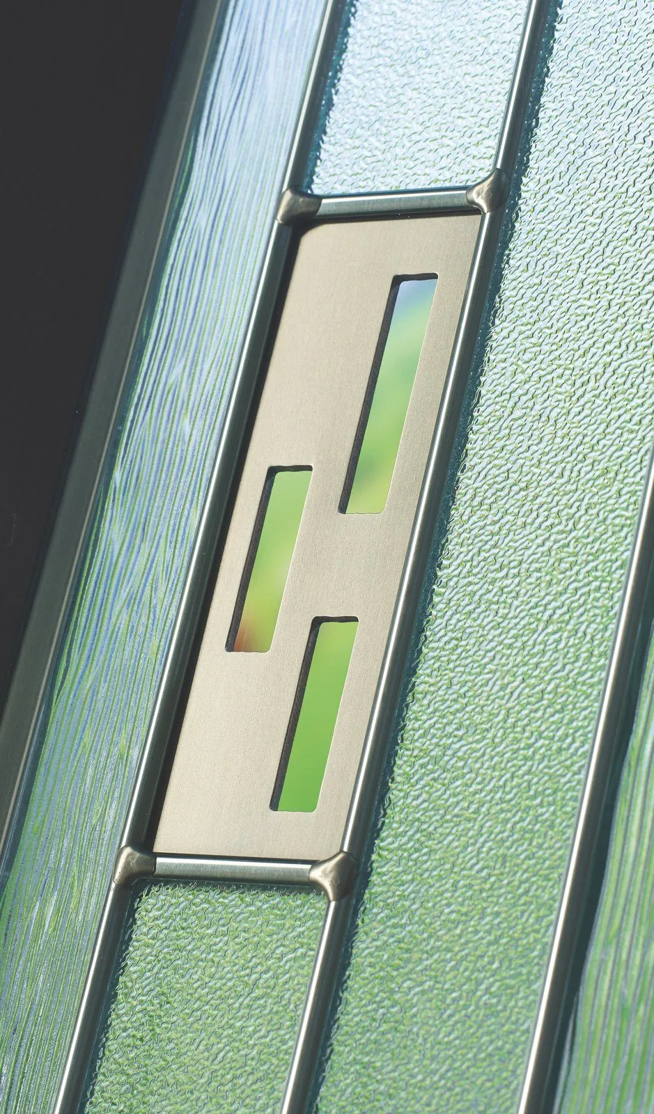 Close up of a decorative composite door glass panel