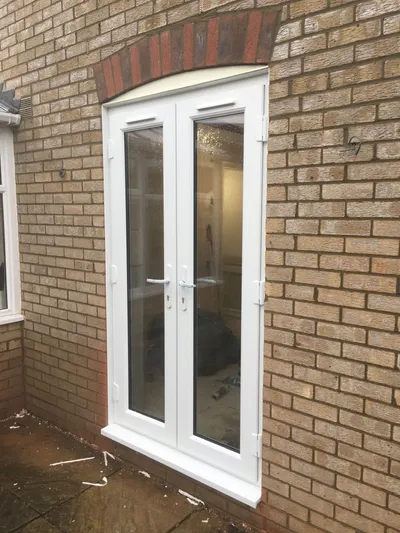 White UPVC French Doors fitted in Northampton