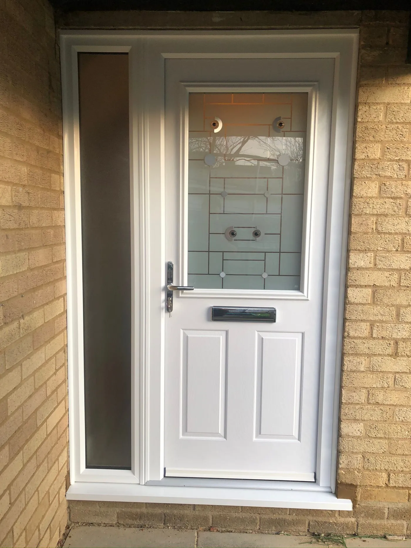 White Composite Door with Decorative Glazing fitted in Northampton