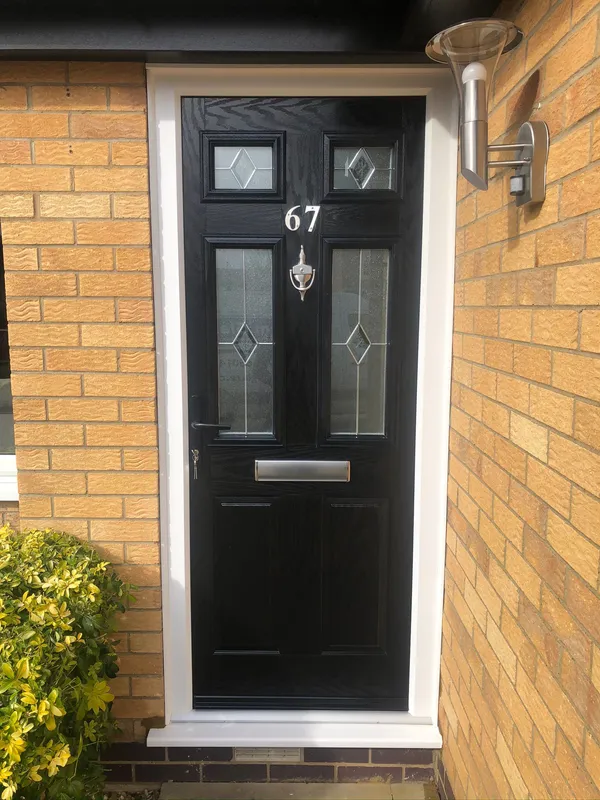Black Composite Front Door with Decorative Glass fitted in Northampton