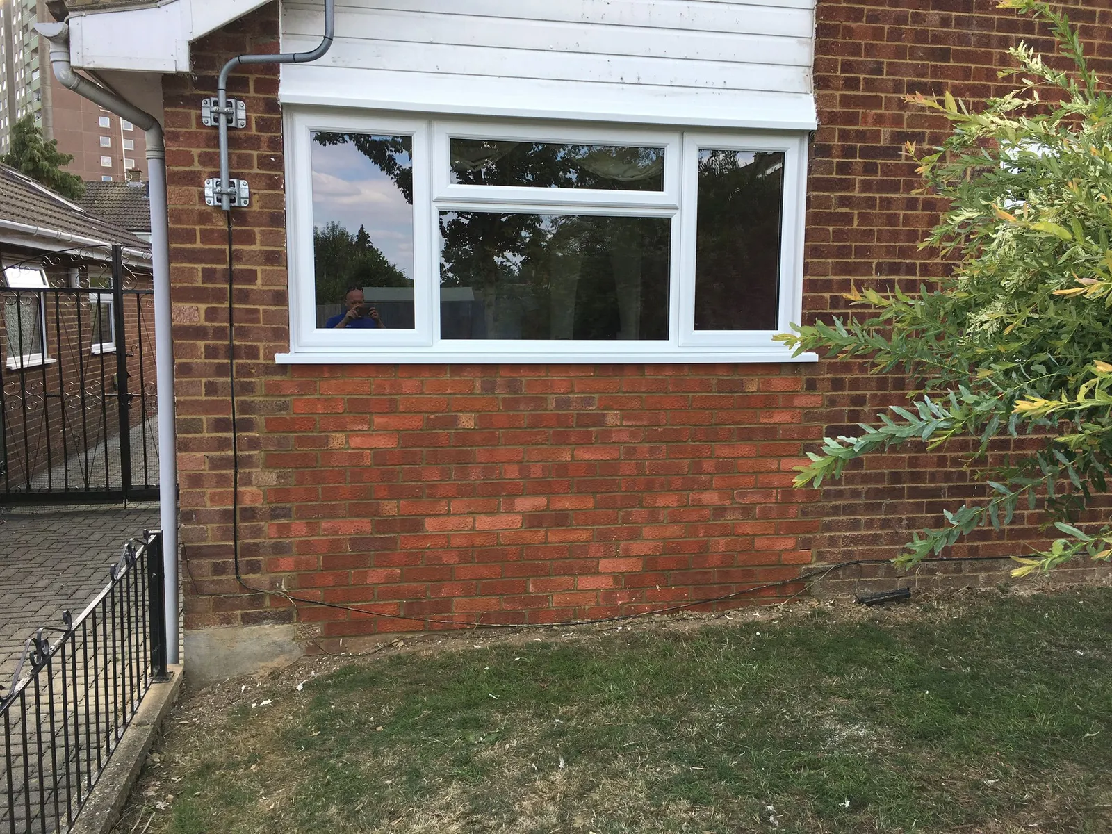 White UPVC casement window installed in a brick property