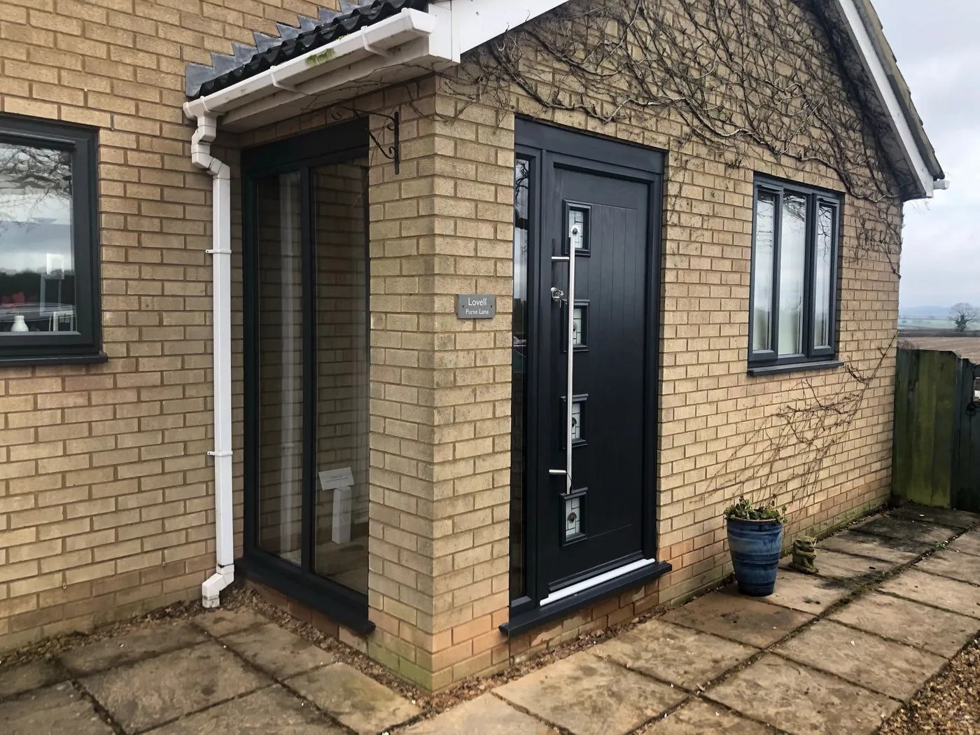 Black Composite Front Door with Decorative Glass fitted in Northampton