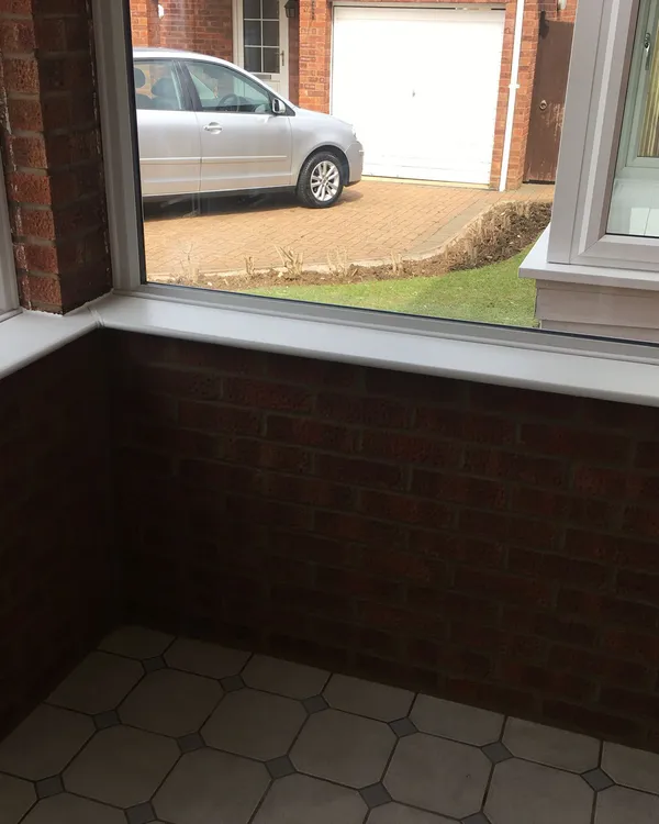 UPVC porch windows with brick base in Northampton