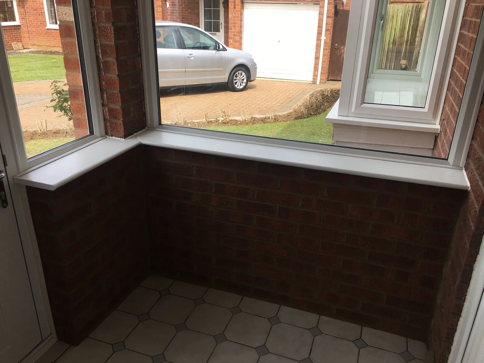 UPVC porch windows with brick base in Northampton