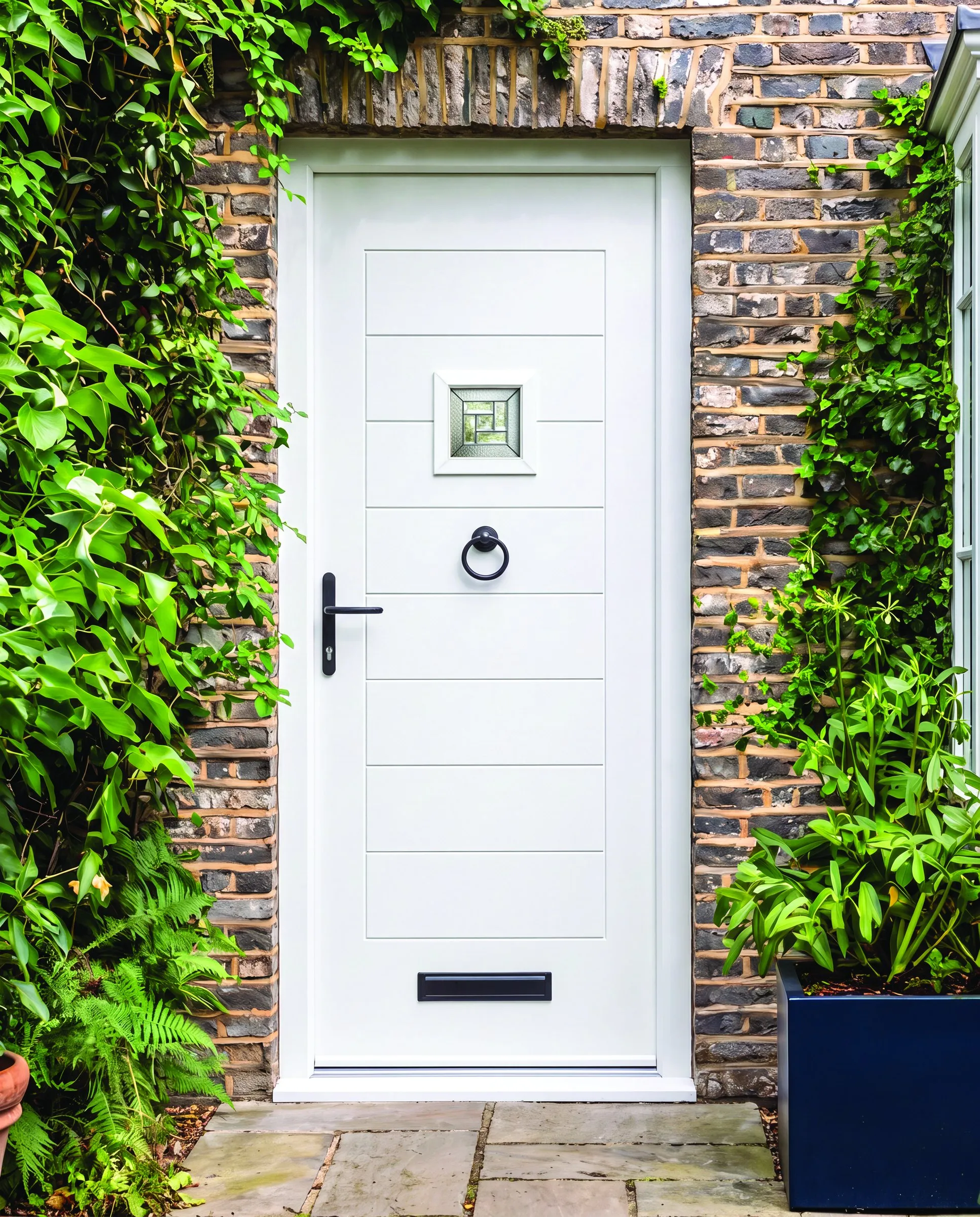 Valencia 1 in White composite door fitted to a house